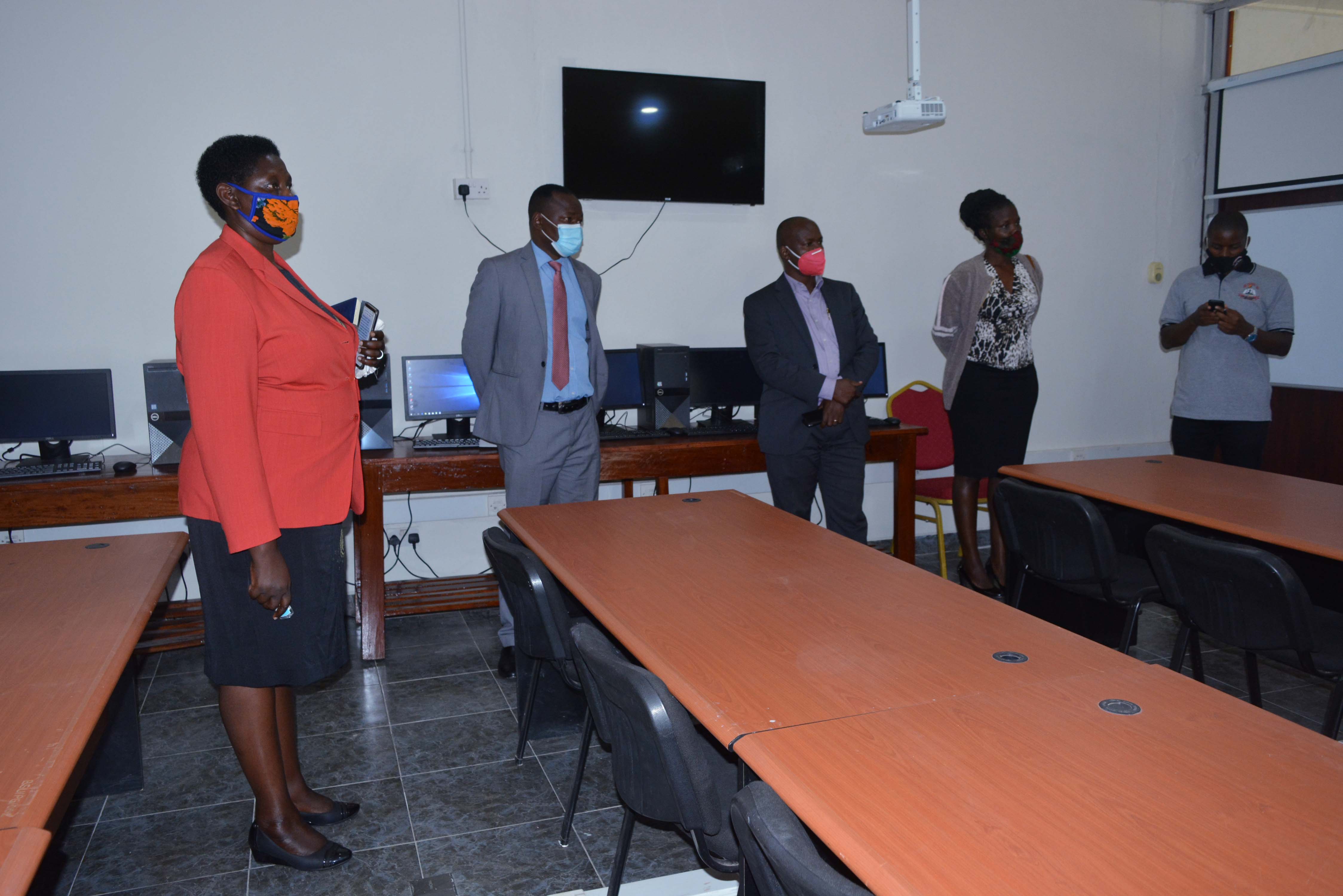 VC, Prof. Maud Kamatenesi Mugusha, Prof. Jude Lubega, Dr. Anthony Kakooza and other officials from NCHE Inside the FAR Center