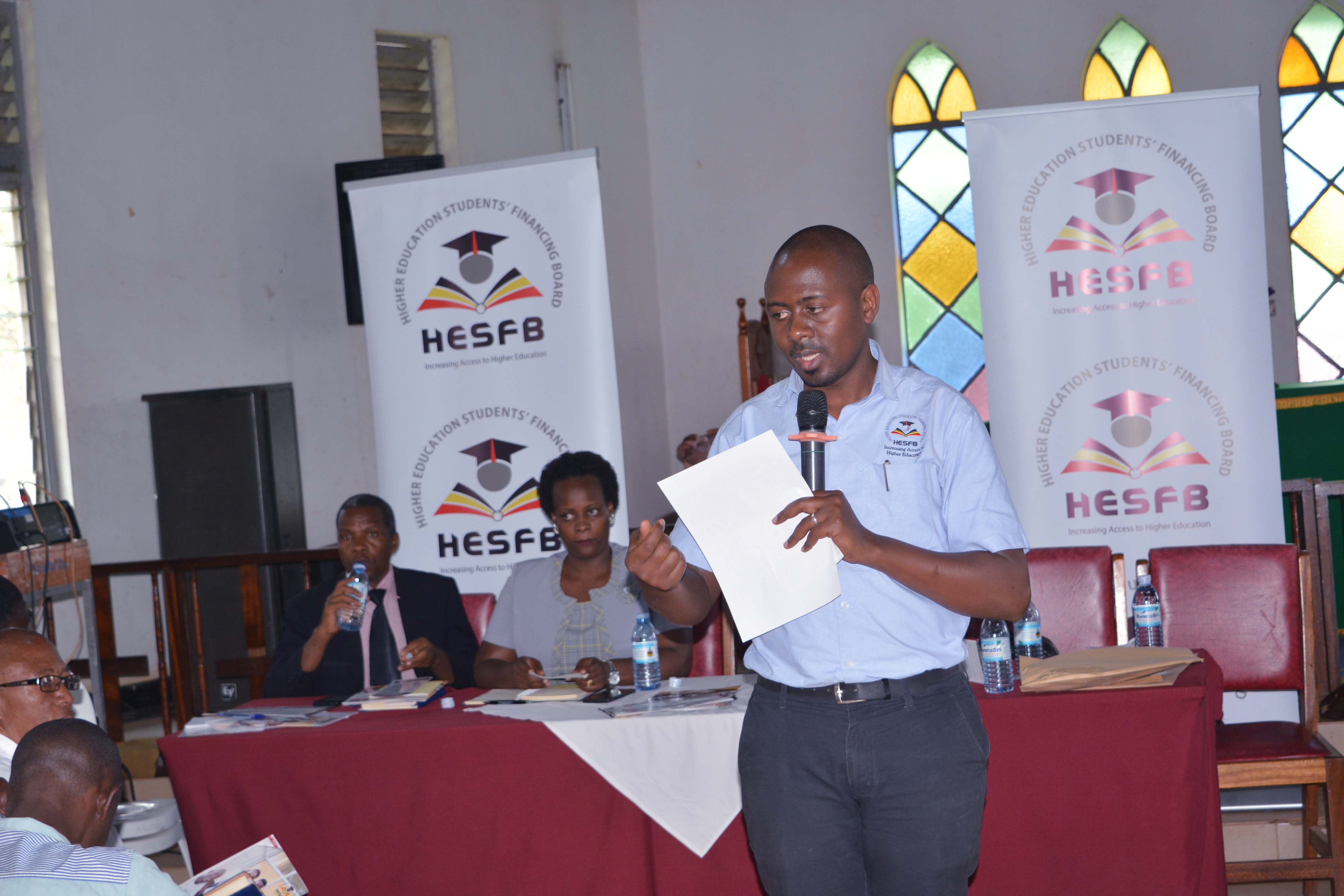 Mr. Bob Nuwagira one of the HESFB Staff sensitising students on the loan scheme