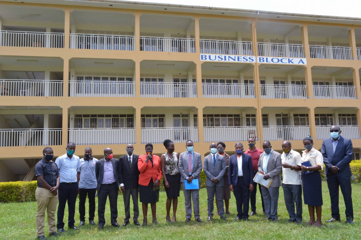 NCHE Officials and Bishop Stuart University Staff Posing for a group photo