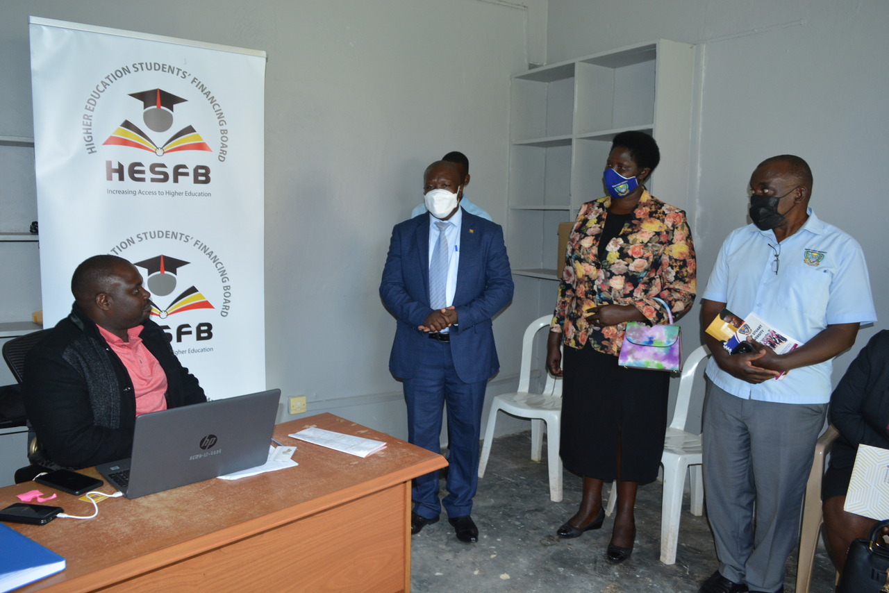 Mr. Bossa Kizito of HESFB officially opens the allocated office premises that will house the application support center 