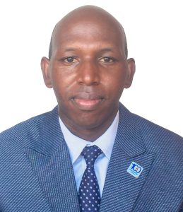 Mr. Abraham Kubakurungi Kyangungu - [MA. Linguistics, Univ. Of Dar es Salaam), BA. Education, (Mak), Administrative Law Course (LDC), Cert. Public Admin, Cert. Computer Applications]