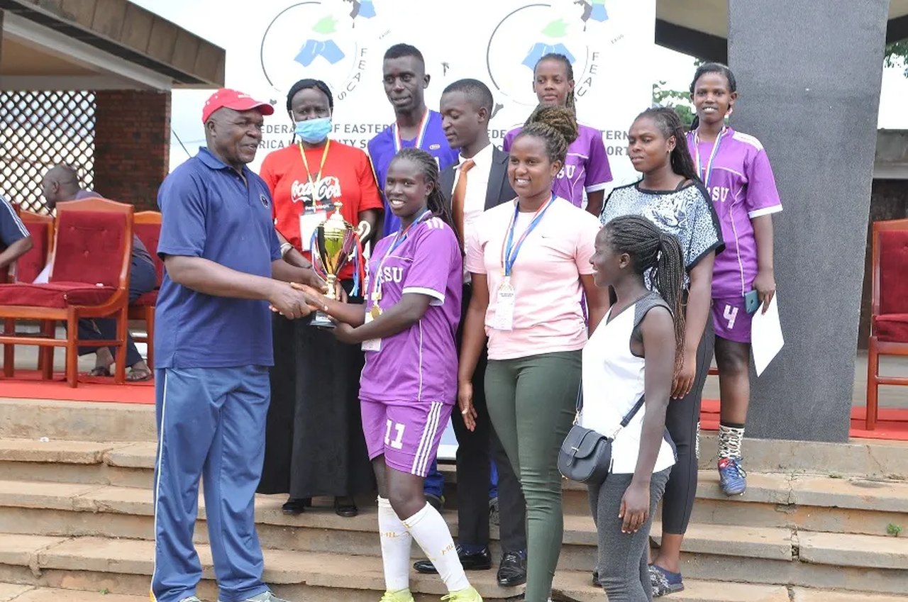 Bishop Stuart University Captains, Students Guild President and Sports Minister receiving a 2nd runner up overall trophy during the FEAUS games