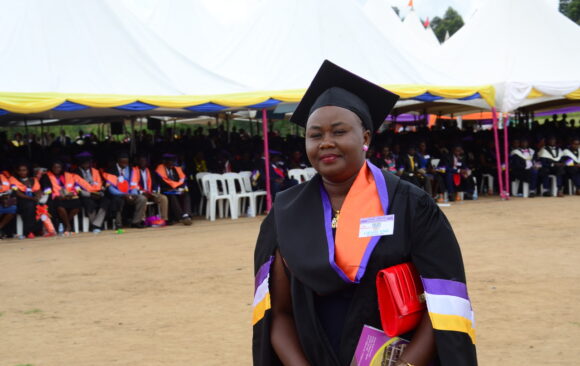 A female graduand moves forward to receive her first class accolade at the 15th BSU Graduation ceremony 18th Oct 2019