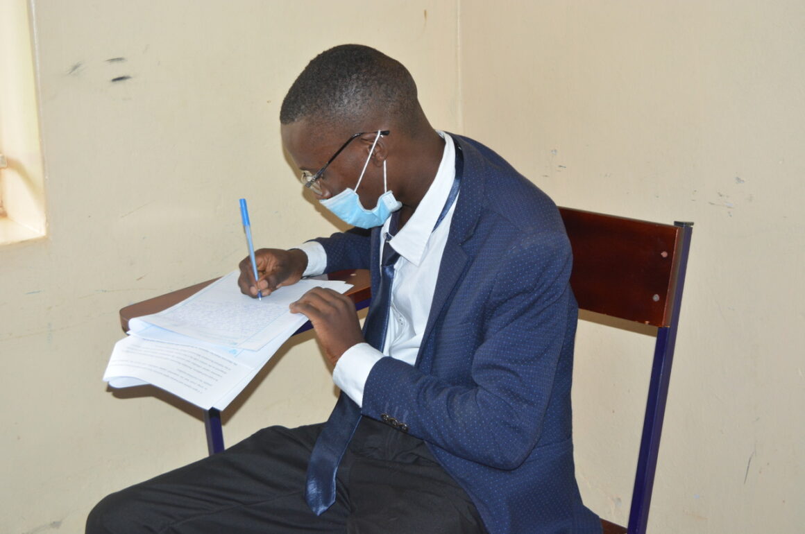 A male student writes his LLB Pre-entry Examination at the Faculty of Law, BSU on 27th September 2021