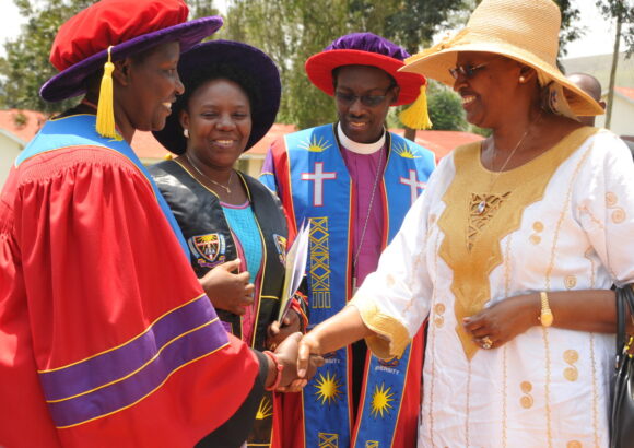 The First Lady, Hon. and Minister Janeti Kataha Museveni being received by the Vice-Chancellor, Prof. Kamatenesi Mugisha