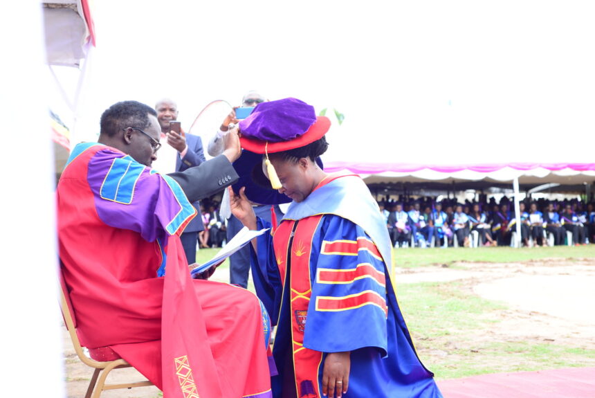The Chancellor, Rt. Rev. Fred Sheldon Mwesigwa (PhD) - Assoc. Prof. of Religious Education, confers a Doctor of Philosophy upon Dr. Donath Asiimire during the 18th Graduation _ 24 ‎March ‎2023