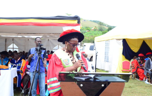 Assoc. Prof. Rebecca Mutebi Kalibwani reads out names of graduands at the 18th congregation of BSU