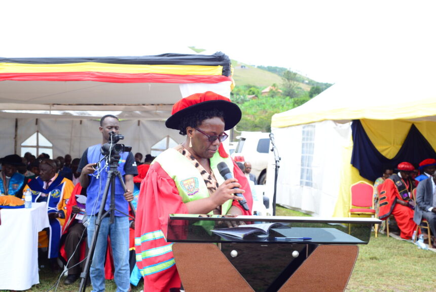 Assoc. Prof. Rebecca Mutebi Kalibwani reads out names of graduands at the 18th congregation of BSU